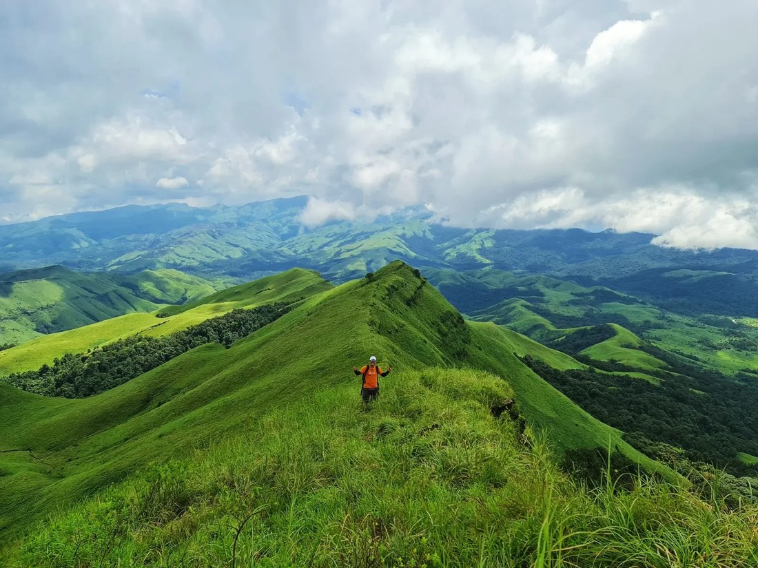 Green ridgelines of Gangadikal Peak