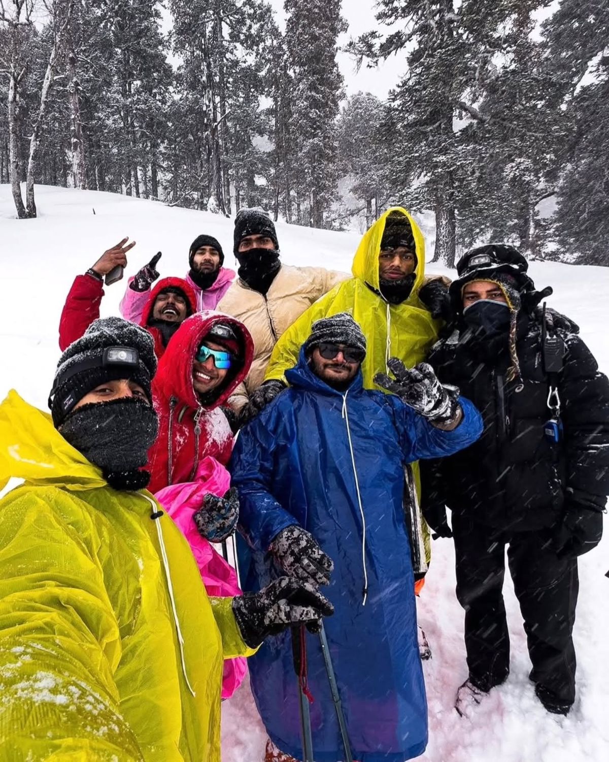 A happy group of trekkers in the snow